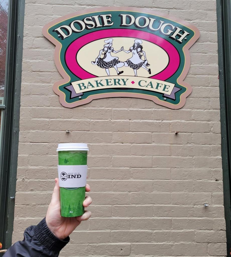 Holding a cup of coffee